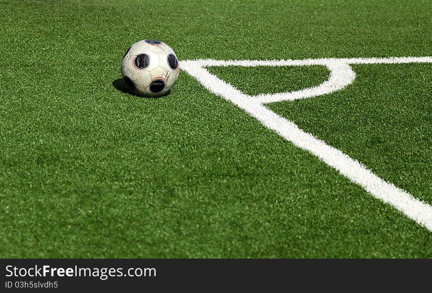 A soccer ball in stadium, corner- selective focus. A soccer ball in stadium, corner- selective focus