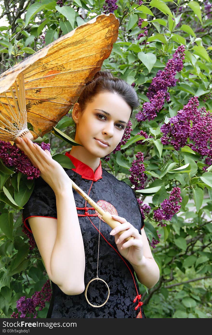 Portrait of an asian style woman in lilac