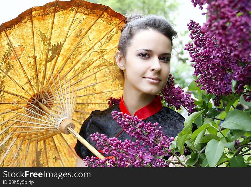 Portrait of an asian style woman in lilac