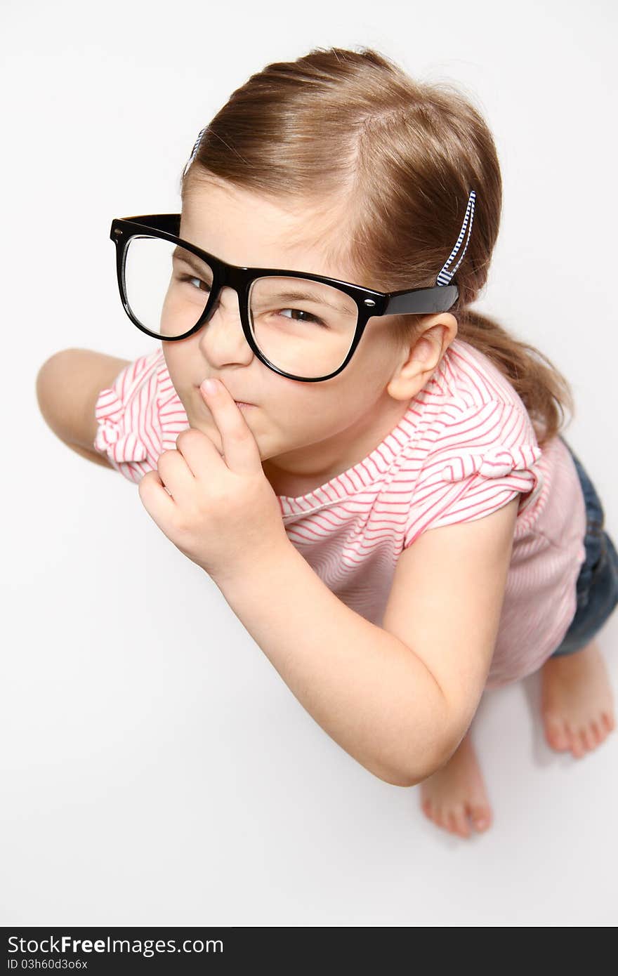 Portrait of lovely smiling girl in glasses