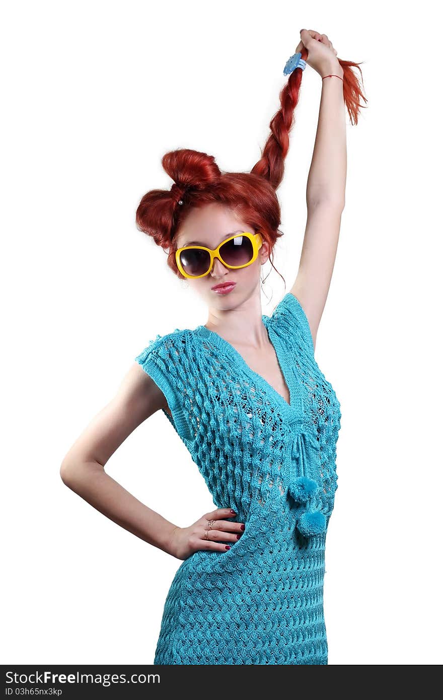 Fashion red-haired woman in a stylish glasses