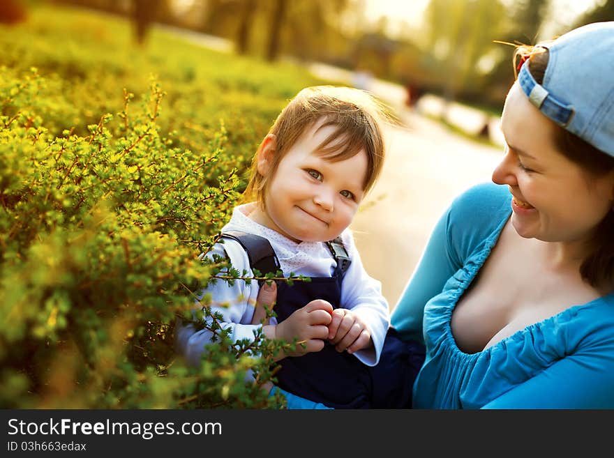 Small girl enjoying life with her mother