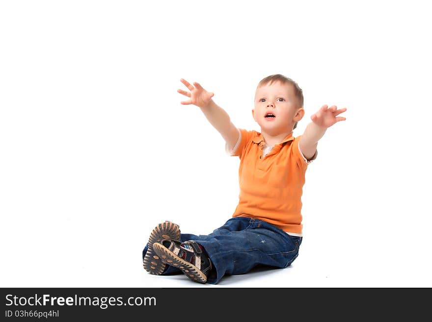 Cute little beautiful boy sitting on floor and hold arms hands to hug, isolated on white background. concept. Cute little beautiful boy sitting on floor and hold arms hands to hug, isolated on white background. concept.