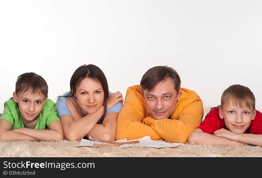 Portrait of a wonderful family on a white