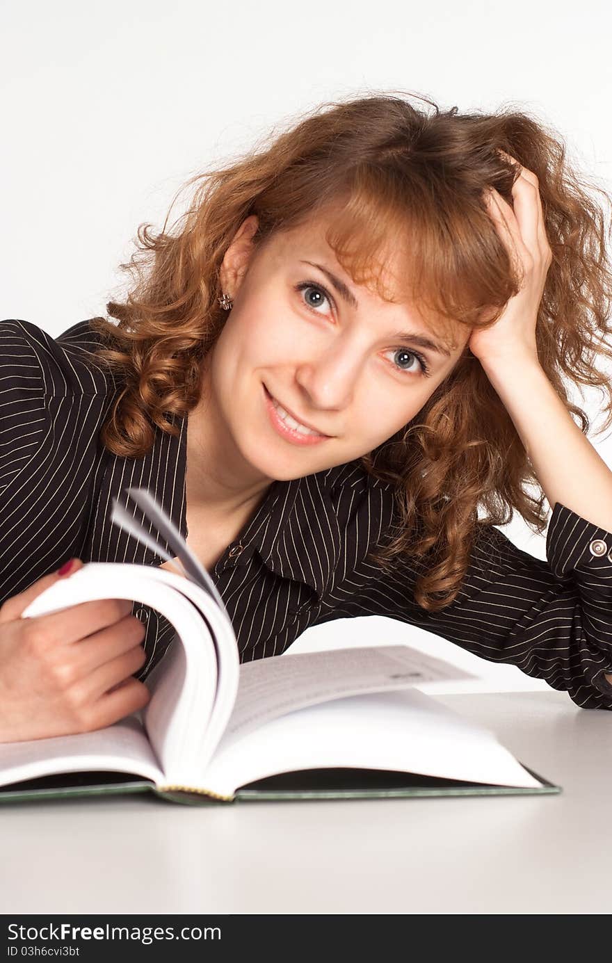 Portrait of a pretty girl with a book. Portrait of a pretty girl with a book