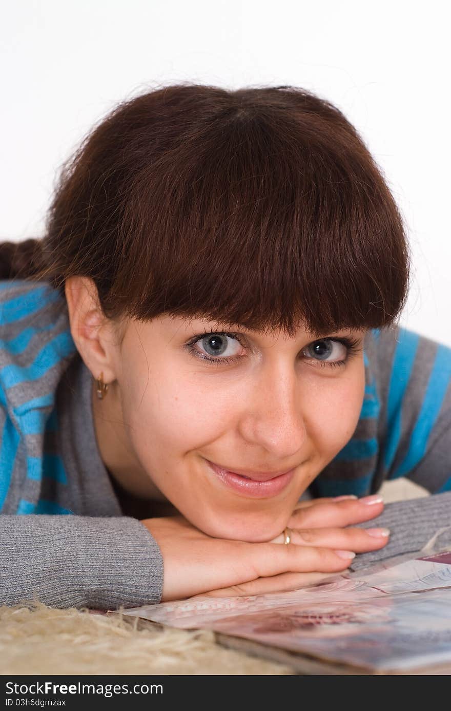 Beautiful girl smiling on the carpet