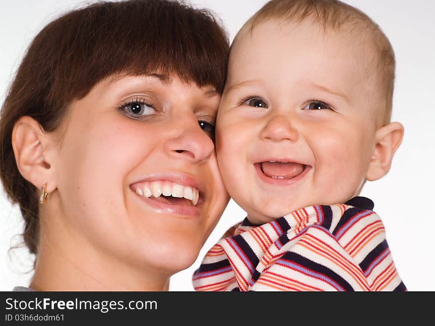 Mother holds her baby