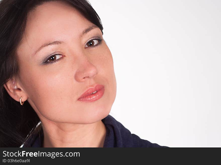 Beautiful girl with dark hair on a white background. Beautiful girl with dark hair on a white background