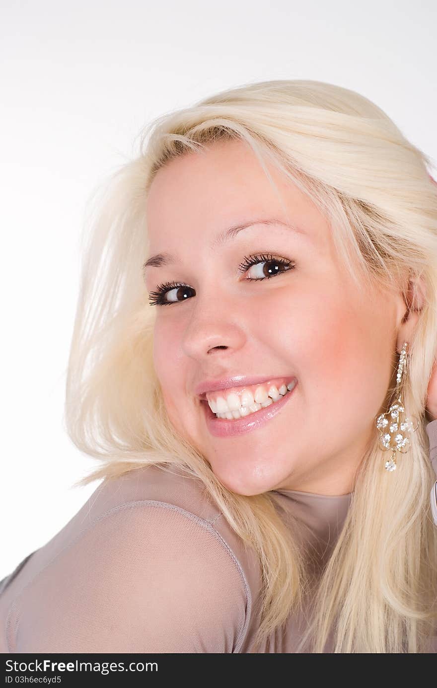 Wonderful girl in a grey clothes on a white background. Wonderful girl in a grey clothes on a white background