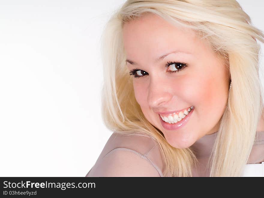 Wonderful girl in a grey clothes on a white background. Wonderful girl in a grey clothes on a white background