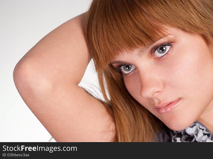 Cute girl posing on a white background. Cute girl posing on a white background