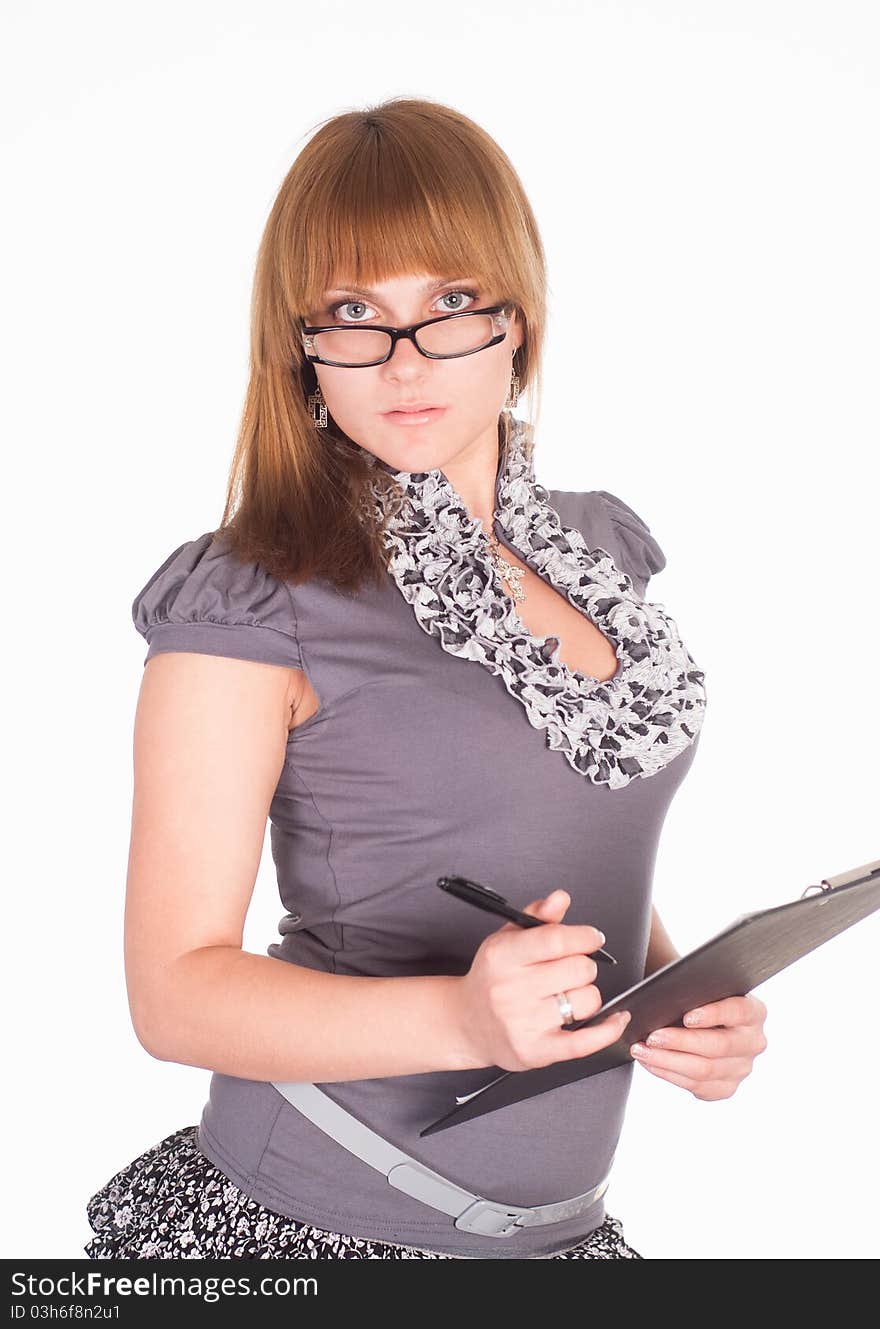 Portrait of a cute girl writing on white