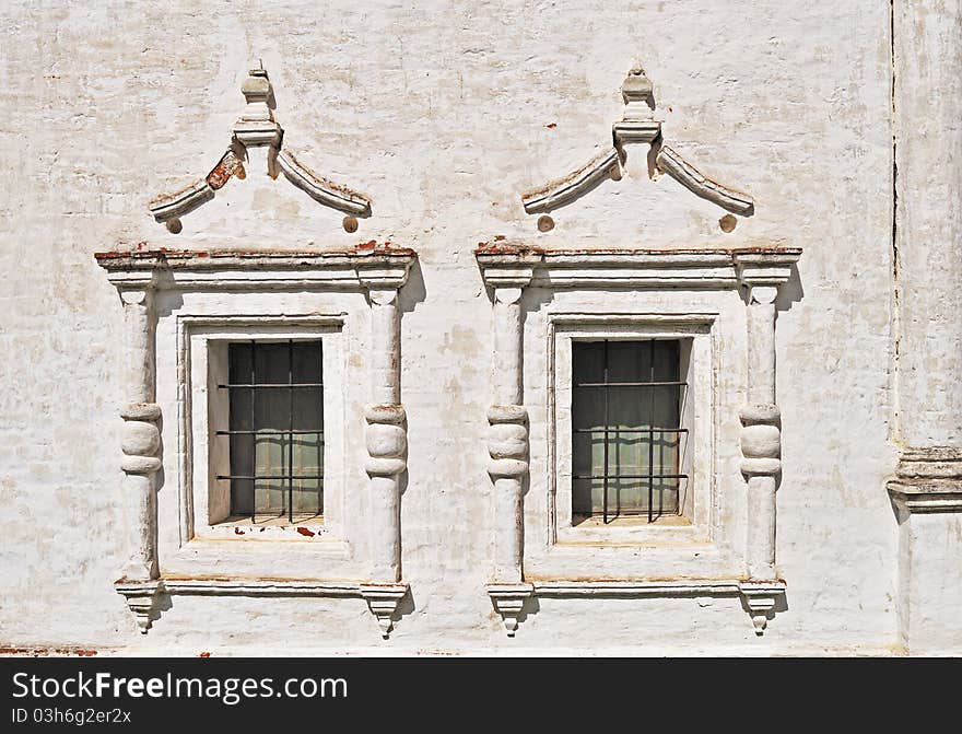 Two vintage windows in ancient monastery