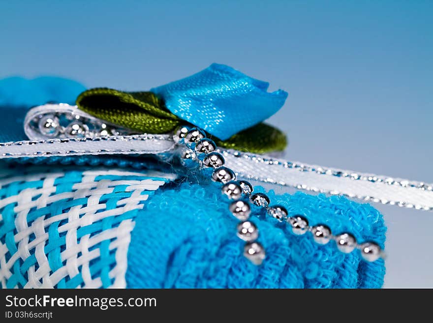 Close up of a blue door gift ready to be given away to guests in a reception. Close up of a blue door gift ready to be given away to guests in a reception