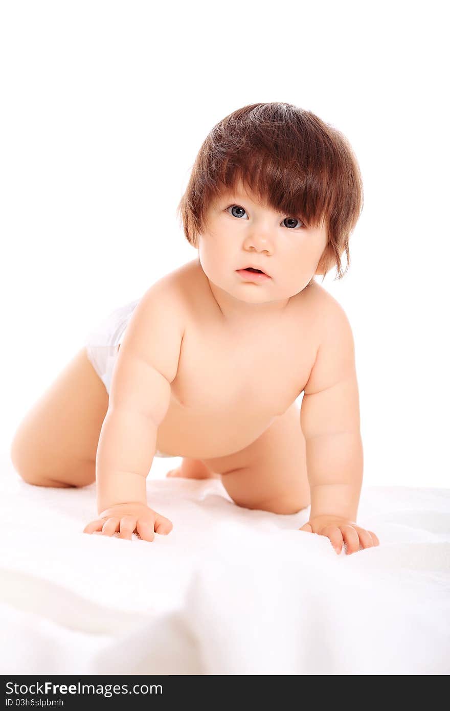 Beautiful baby. Shot in studio. Isolated on white. Beautiful baby. Shot in studio. Isolated on white.