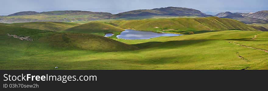 Ushkonyr lake, Almaty, Kazakhstan, alpine hills with lake