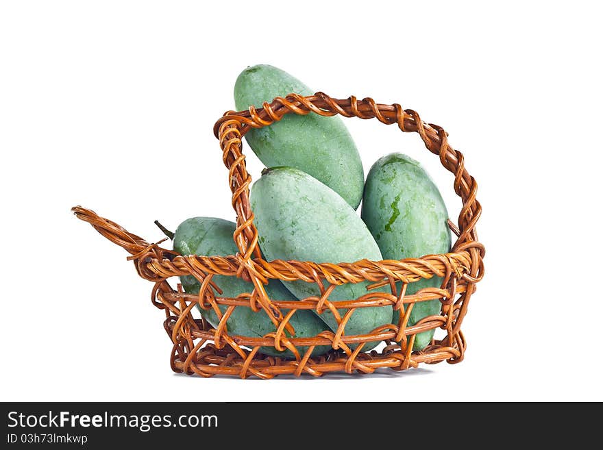 Mangoes in the basket on white