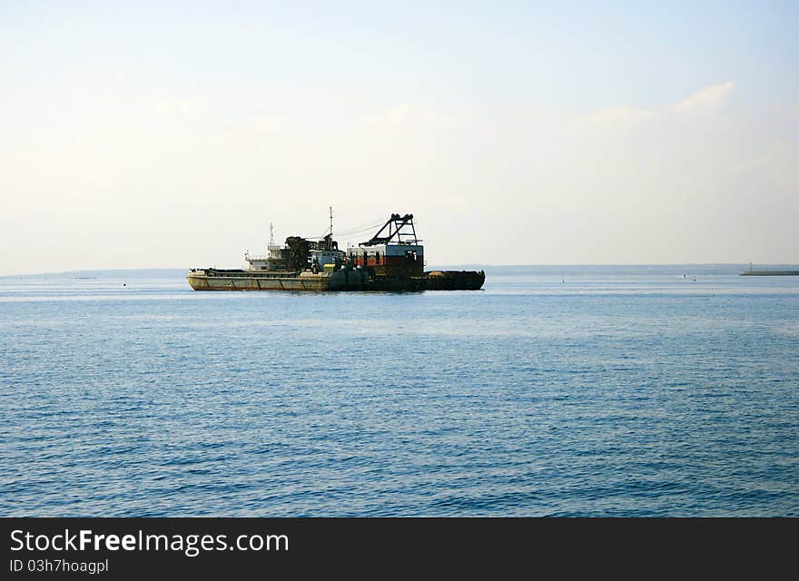 Ship on blue Mediterranean sea. Ship on blue Mediterranean sea.