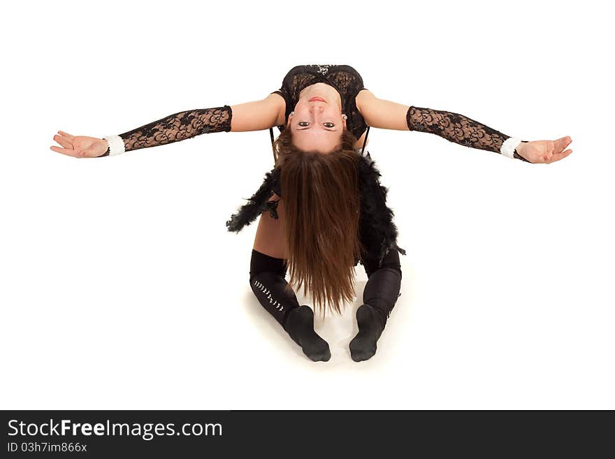 Model in costume of black angel posing for photo