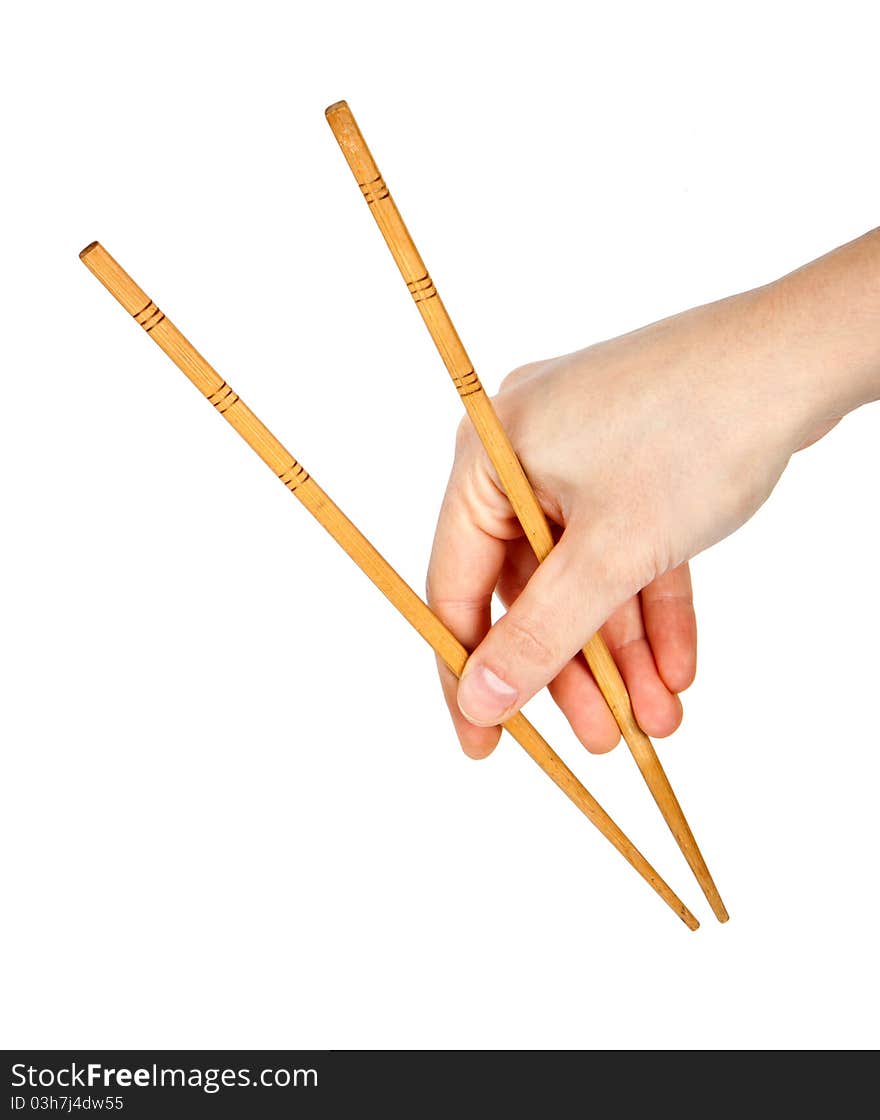 Hand with chopsticks isolated on white background