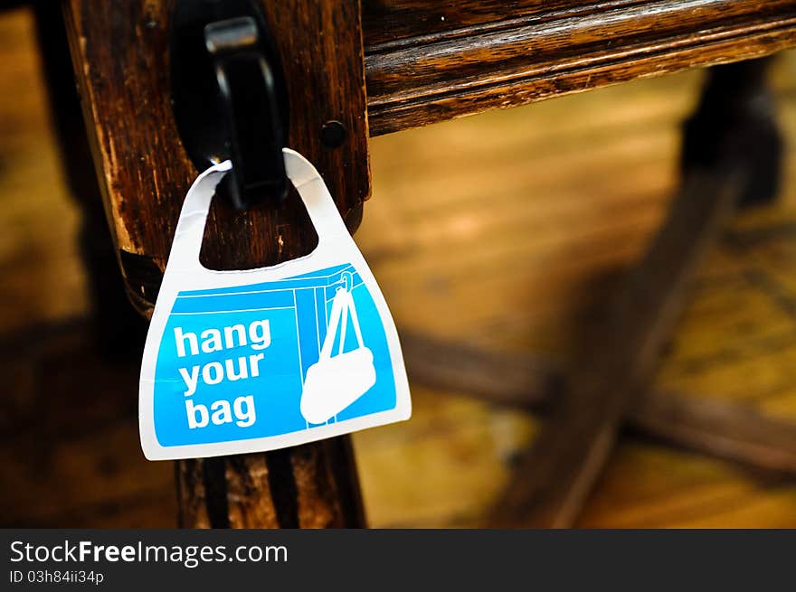 Hang your bag, sign