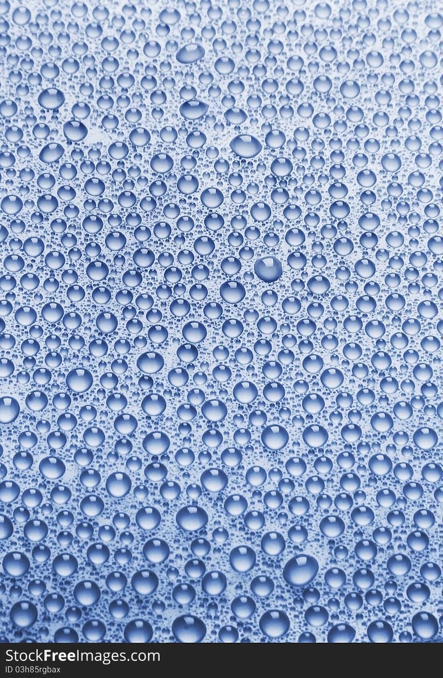 Close-up of water drops on glass