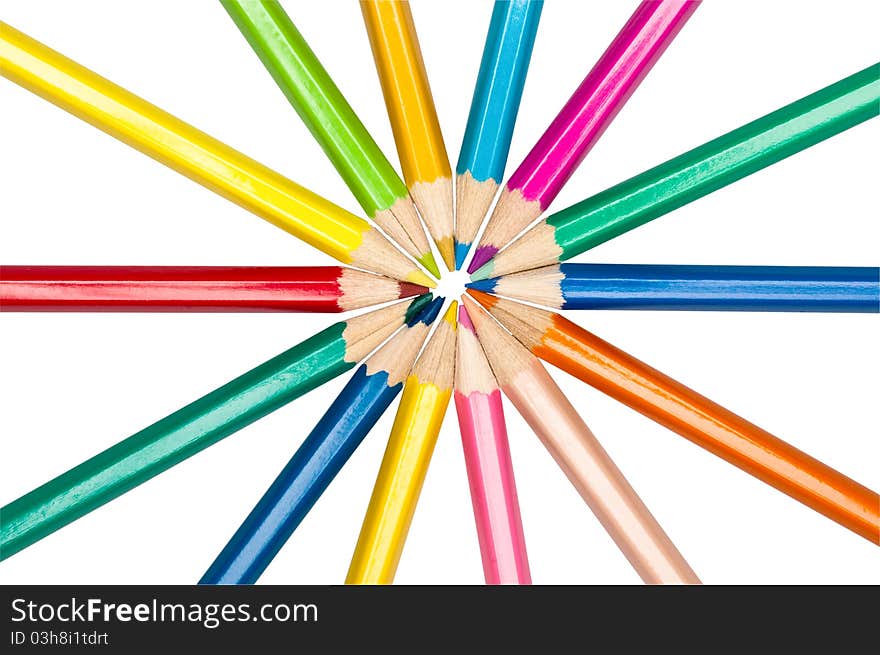 Set of colored pencils arranged in circle isolated