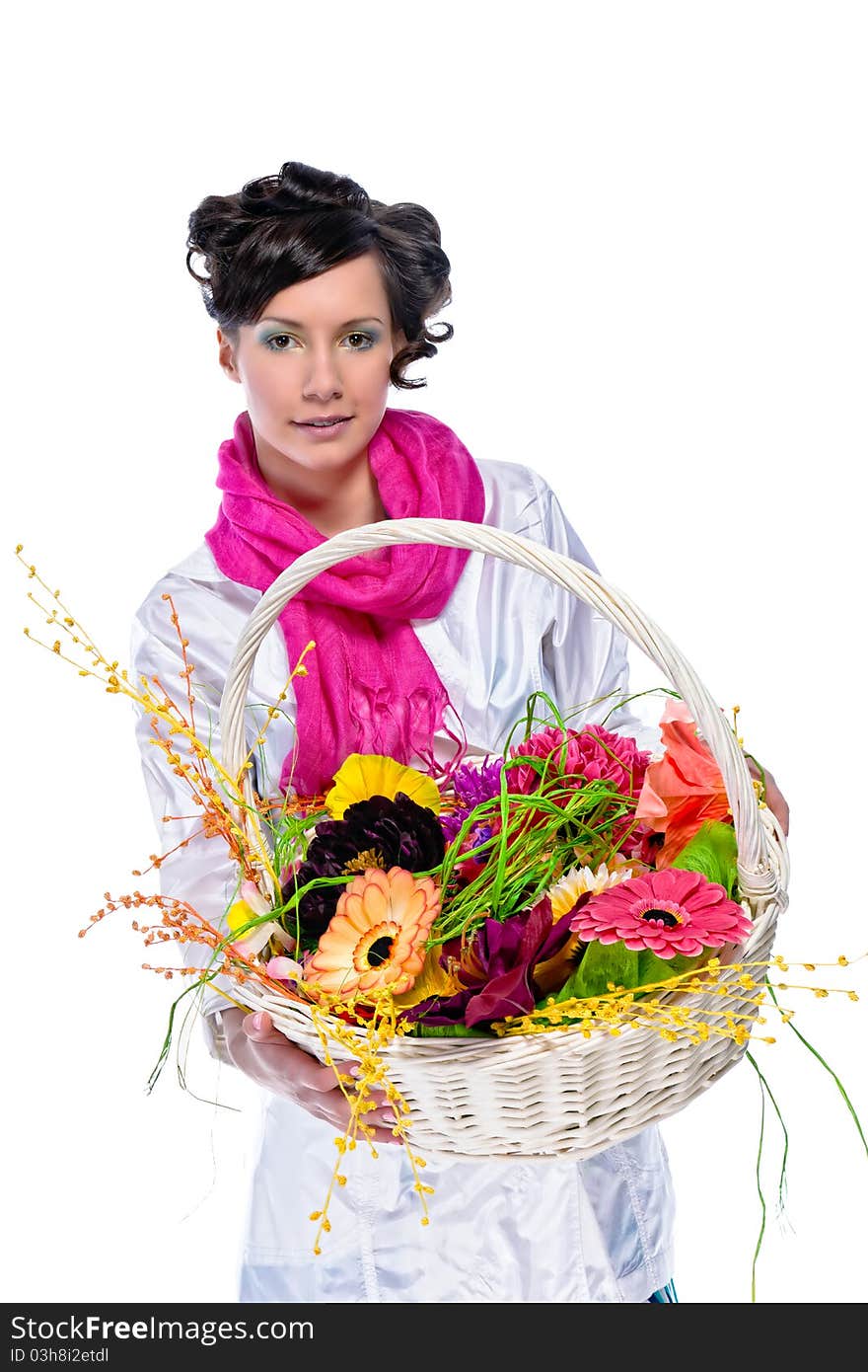 Beautiful young woman with basket full of flowers. Beautiful young woman with basket full of flowers