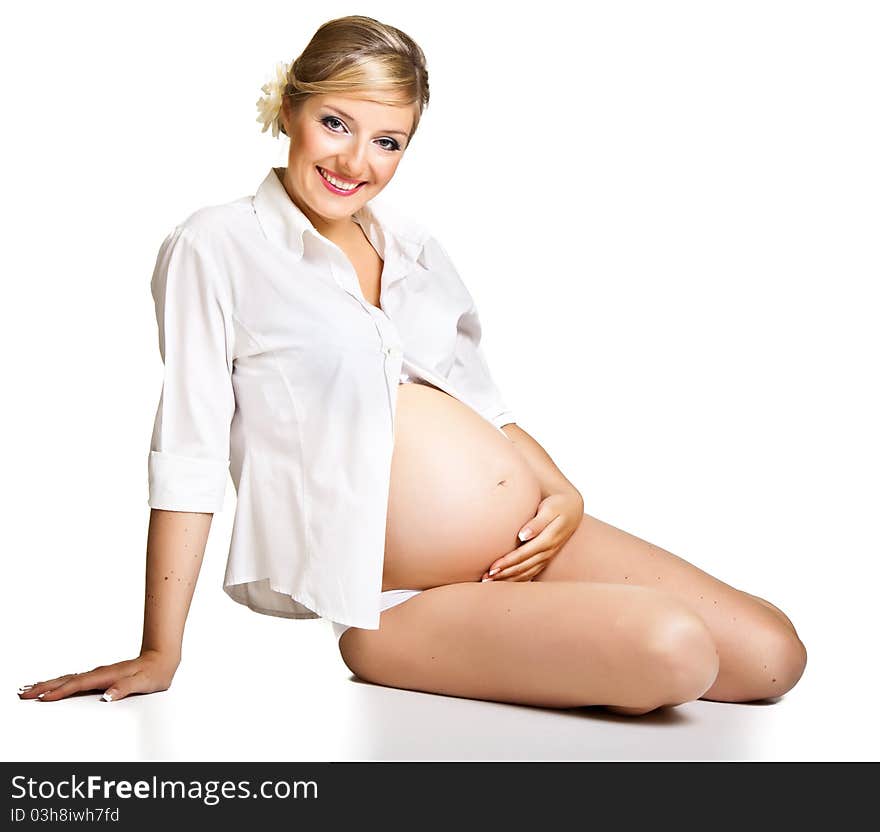 Pregnant woman isolated on white