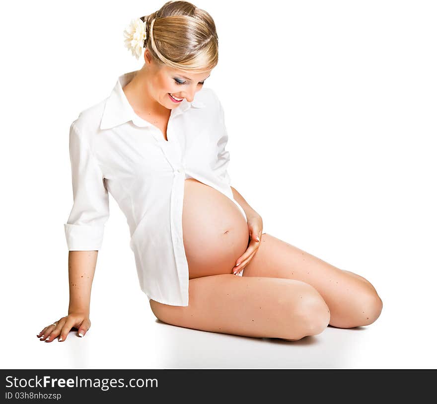 Pregnant woman isolated on white