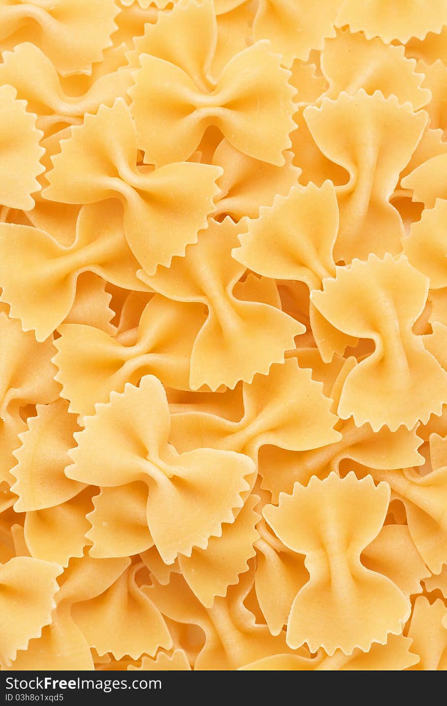 Bow tie pasta forming a background