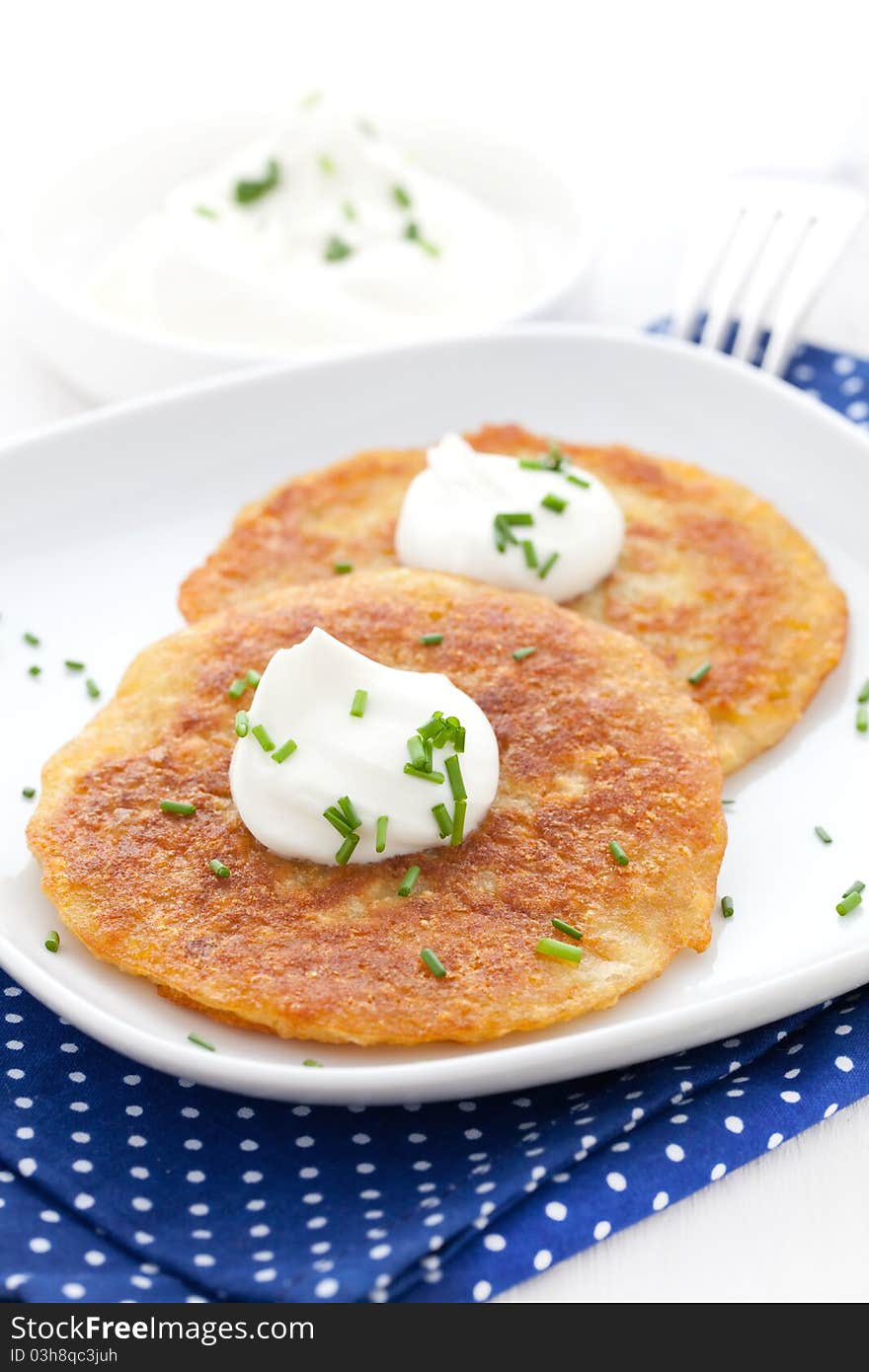 Potato pancakes with sour cream