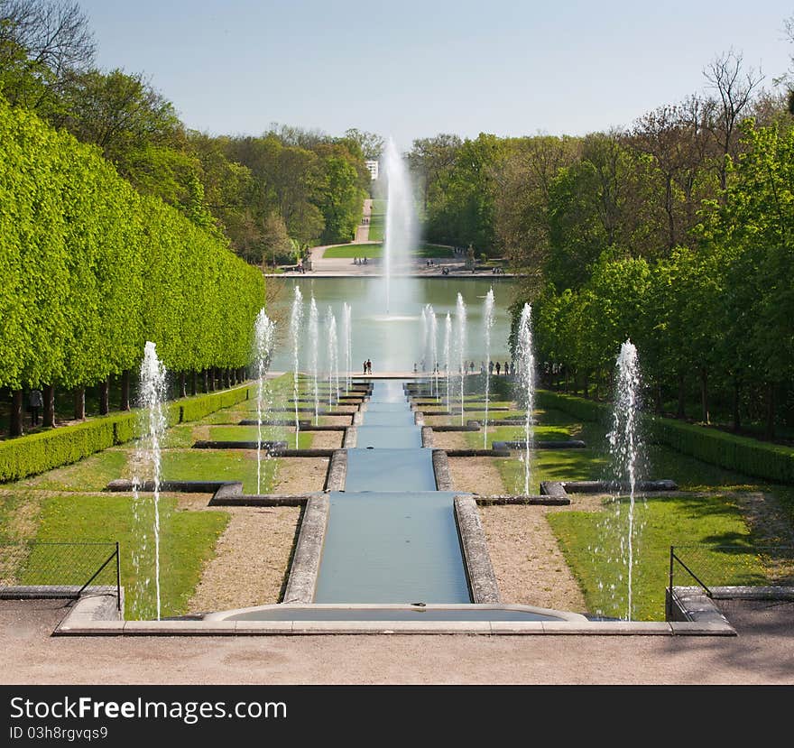 Foutains with water gushing in a nice park in France