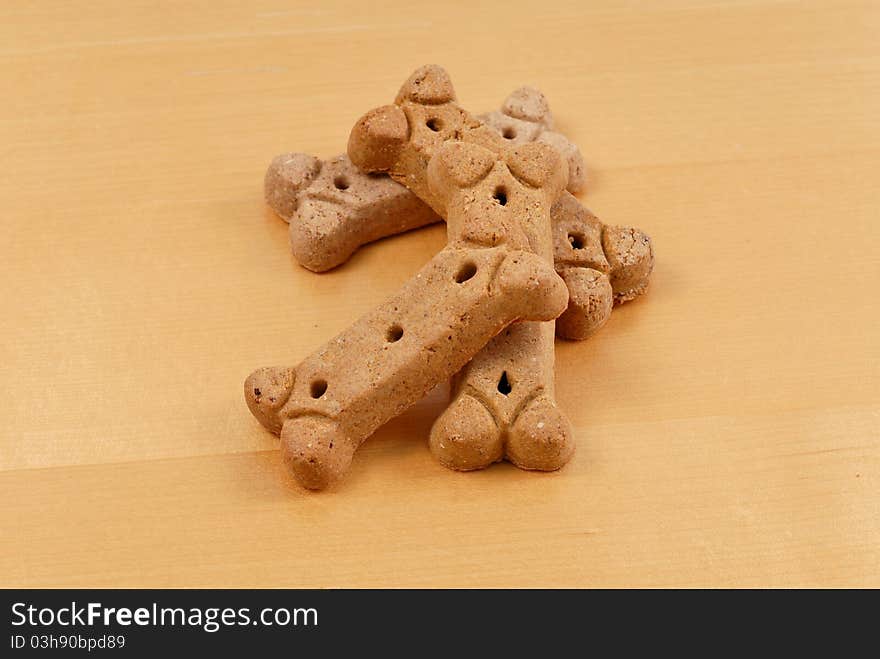 Pile of Dog Bone Treats On Wood