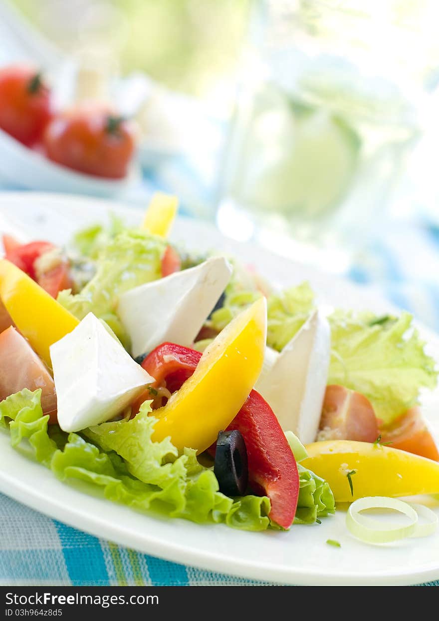 Gresh vegetable salad with cheese. Shallow depth, selective focus