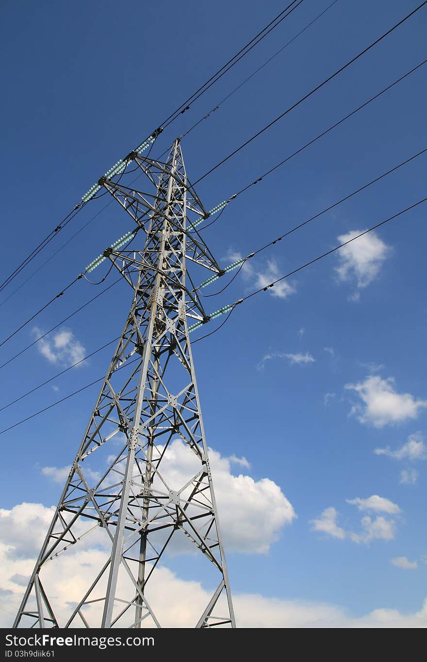 Electricity pole on blue sky background. Electricity pole on blue sky background