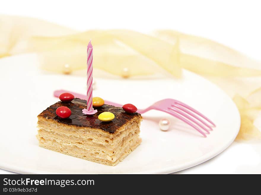 Delicious birthday cake with candle