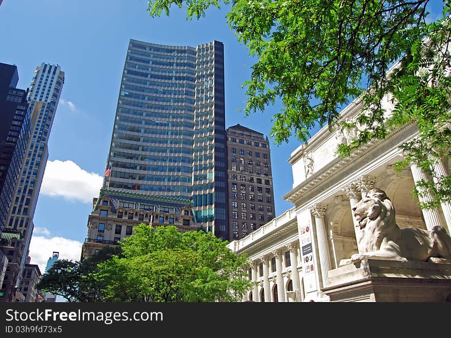 The main library of the city of new york situated on fifth avenue just south of forty second street in midtown Manhattan. The library is a landmark and a favorite destination for tourists and local residents. The main library of the city of new york situated on fifth avenue just south of forty second street in midtown Manhattan. The library is a landmark and a favorite destination for tourists and local residents.