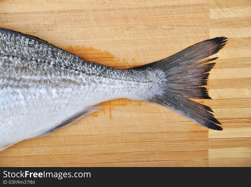 The tail of a fresh bream fish. The tail of a fresh bream fish