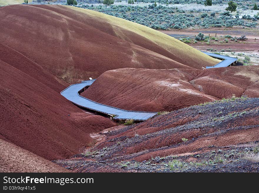 A boardwalk leads through a section of painted hills in Oregon. A boardwalk leads through a section of painted hills in Oregon.