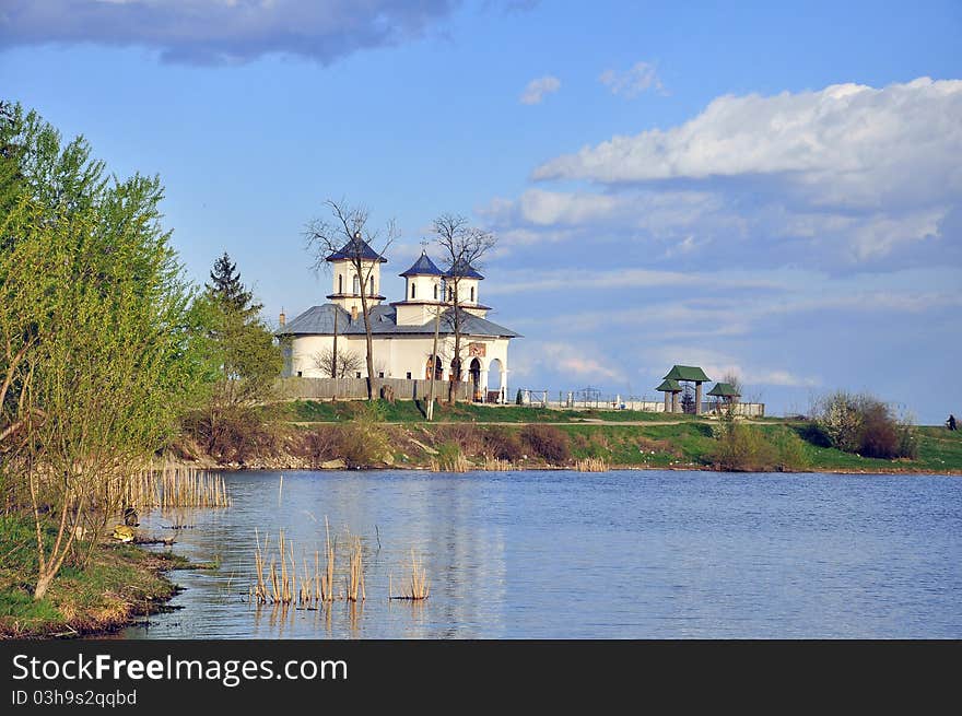 Bratesti church near the lake in targoviste city of romania. Targoviste is the former capital of romania and the city of dracula