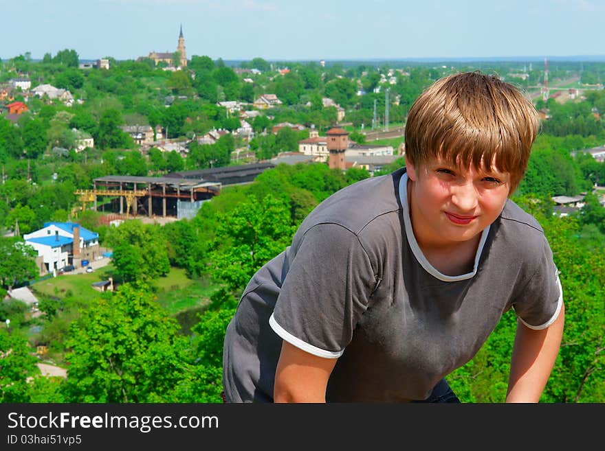 Portrait of a boy on a city background