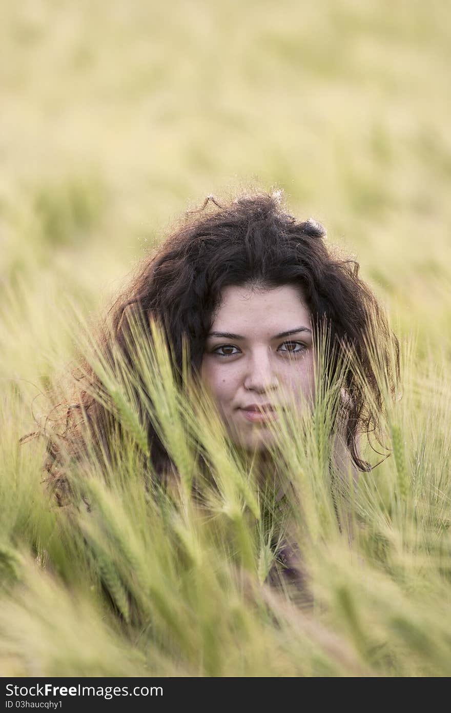 Photo of girl in green wheat field