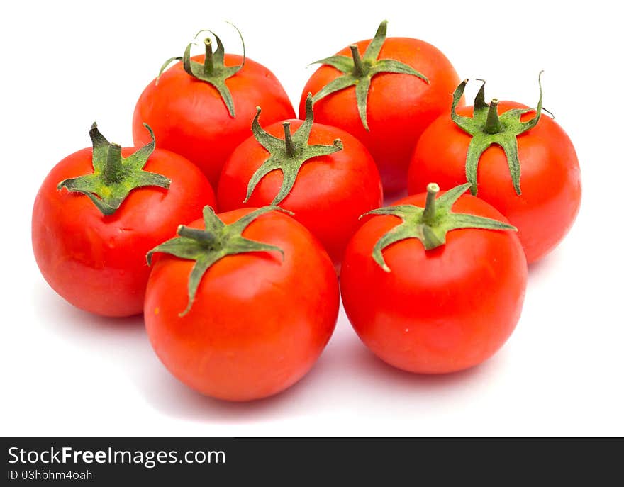 Red tomatoes isolated on a white background