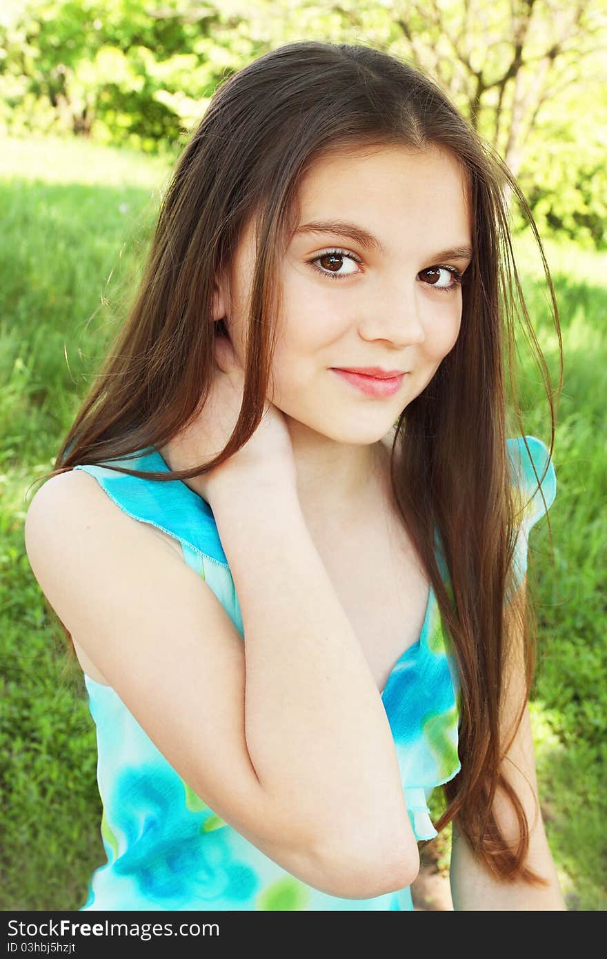 Portrait young girl in the turquoise sarafan