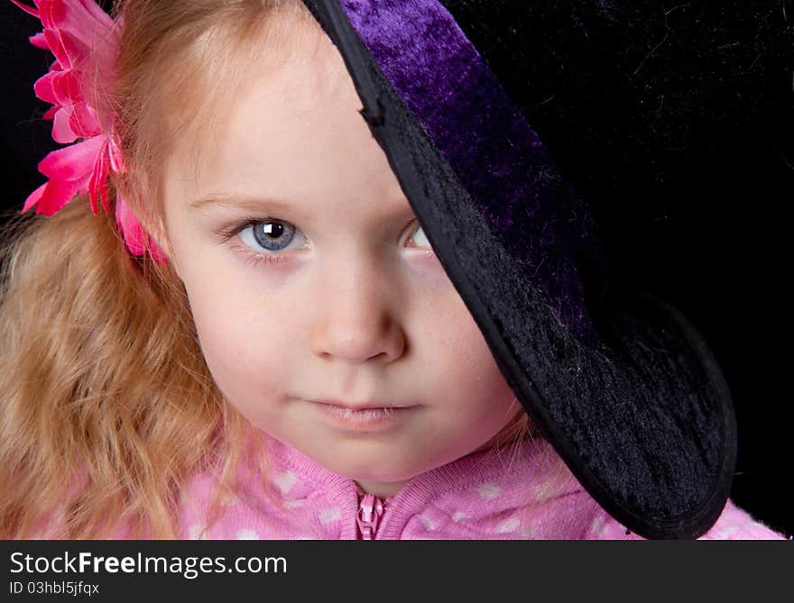 An amazing image of an adorable girl wearing a hat. An amazing image of an adorable girl wearing a hat.