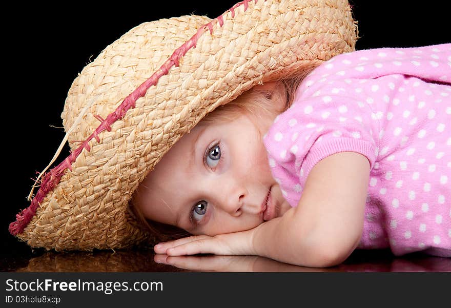 An amazing image of an adorable girl wearing a hat. An amazing image of an adorable girl wearing a hat.