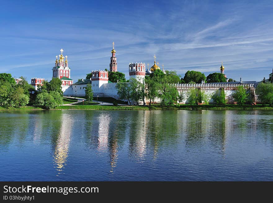 Photo of a monastery against the dark blue sky. Photo of a monastery against the dark blue sky.