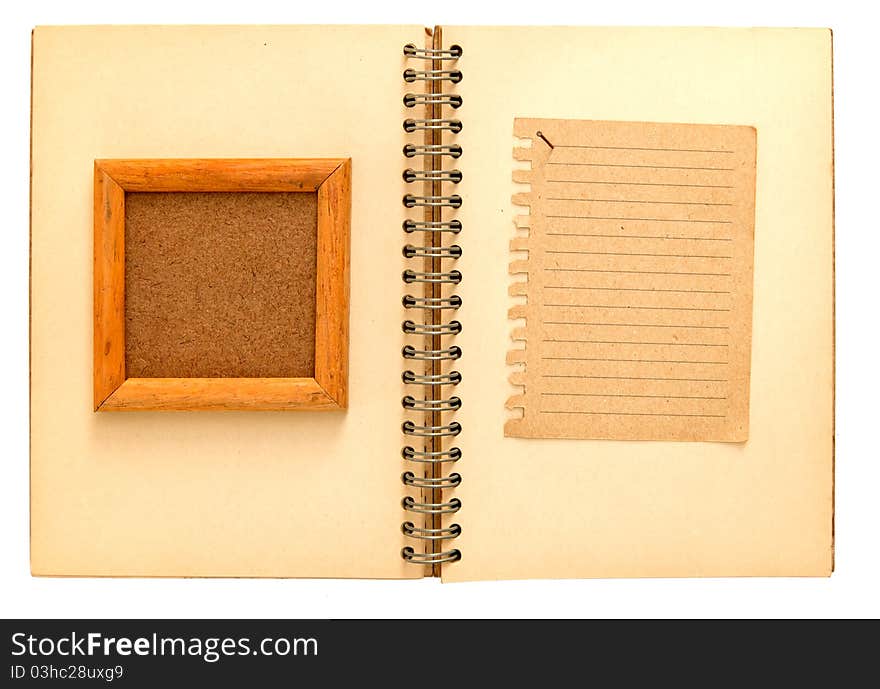 Wooden frame over the notebook notepad