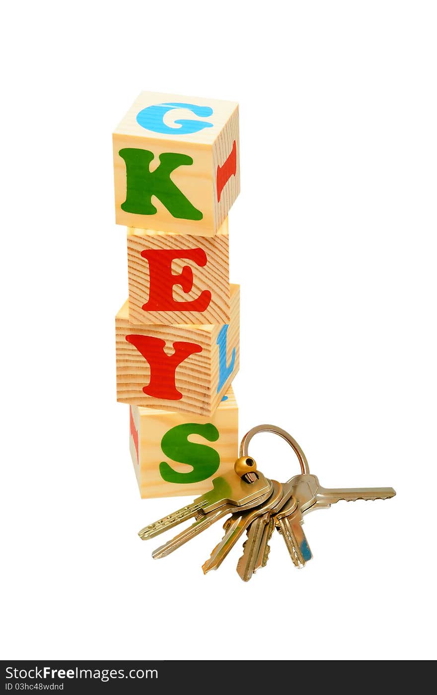 Alphabet wood blocks forming the word Keys isolated on a white background. Alphabet wood blocks forming the word Keys isolated on a white background